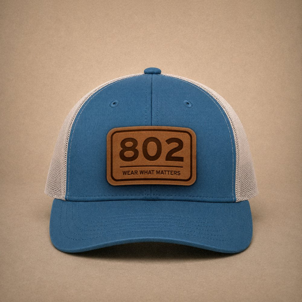 Steel Blue Vermont hats — Vermont 802 Leather Patch Trucker Hat