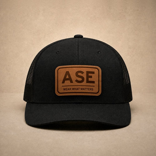 Black Aspen hats — Aspen ASE Leather Patch Trucker Hat