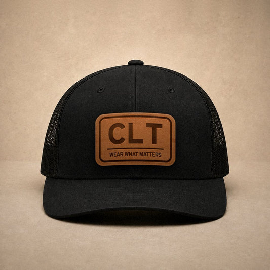Black Charlotte hats — Charlotte CLT Leather Patch Trucker Hat