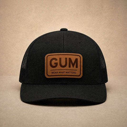 Black Guam hats — Guam GUM Leather Patch Trucker Hat