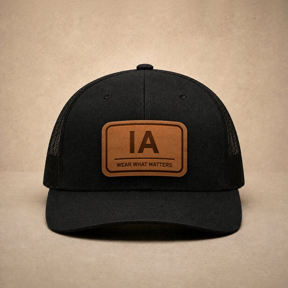 Black Iowa hats — Iowa IA Leather Patch Trucker Hat