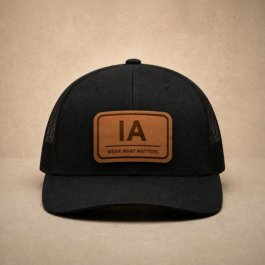 Black Iowa hats — Iowa IA Leather Patch Trucker Hat