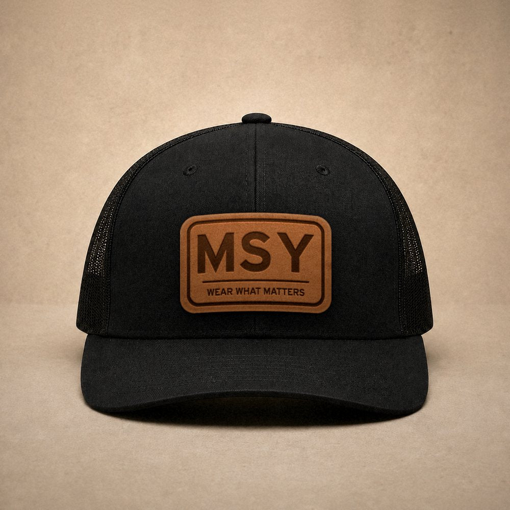 Black New Orleans hats — New Orleans MSY Leather Patch Trucker Hat