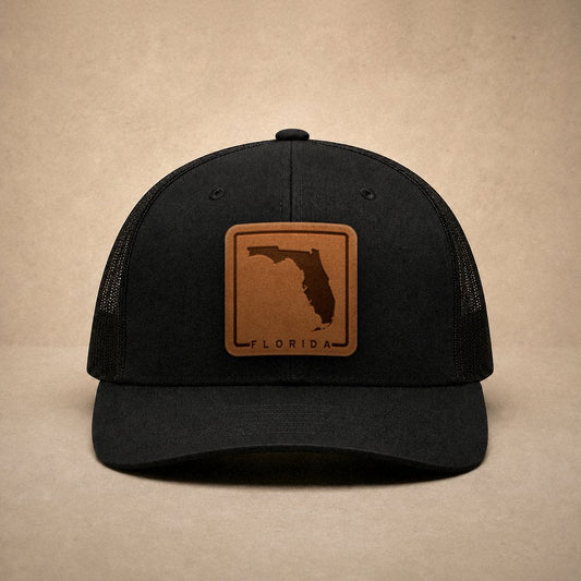 Black Florida hats — Florida Outline Leather Patch Trucker Hat