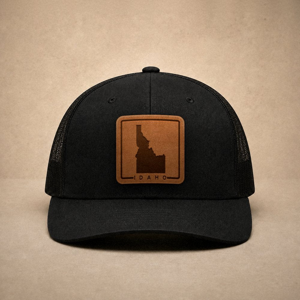Black Idaho hats — Idaho Outline Leather Patch Trucker Hat