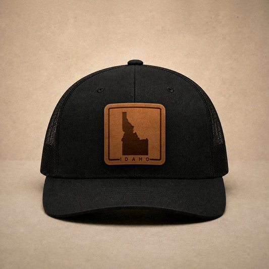 Black Idaho hats — Idaho Outline Leather Patch Trucker Hat