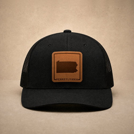 Black Pennsylvania hats — Pennsylvania Outline Leather Patch Trucker Hat
