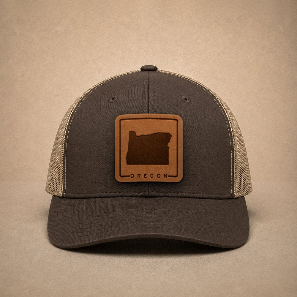 Brown Oregon hats — Oregon Outline Leather Patch Trucker Hat