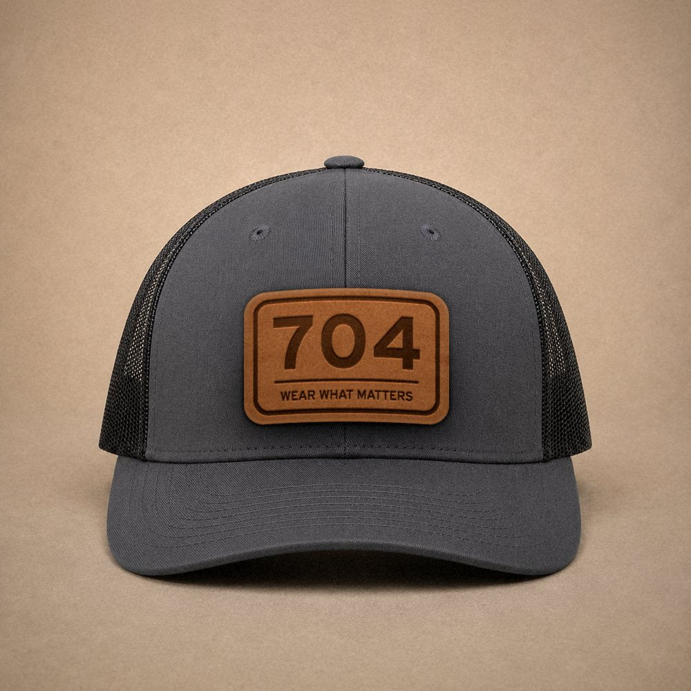 Charcoal Charlotte hats — Charlotte 704 Leather Patch Trucker Hat