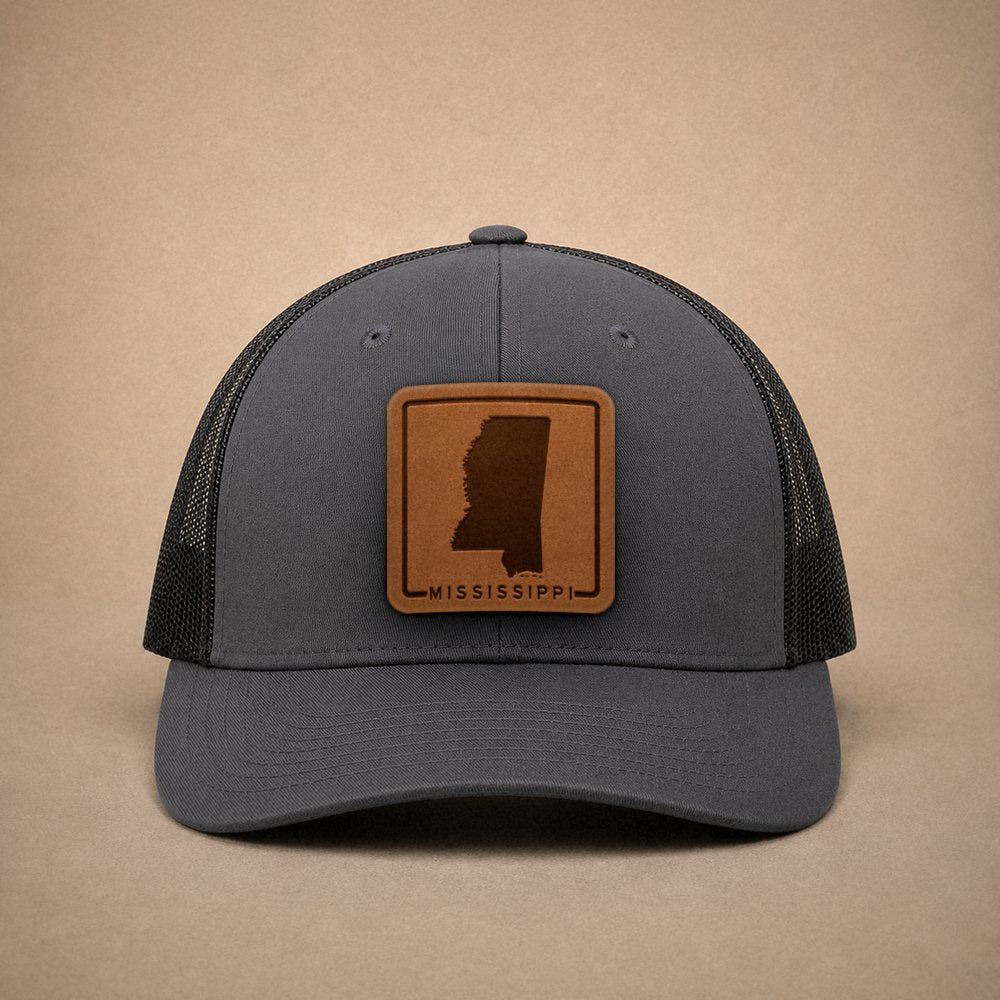 Charcoal Mississippi hats — Mississippi Outline Leather Patch Trucker Hat