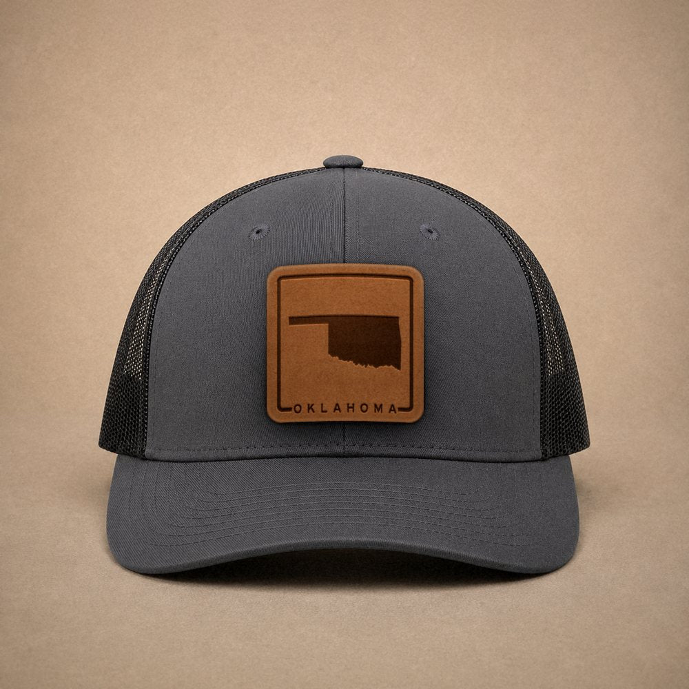 Charcoal Oklahoma hats — Oklahoma Outline Leather Patch Trucker Hat