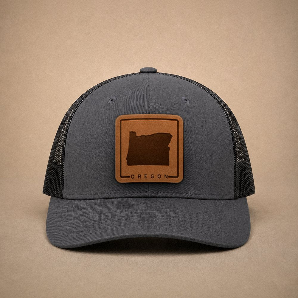 Charcoal Oregon hats — Oregon Outline Leather Patch Trucker Hat
