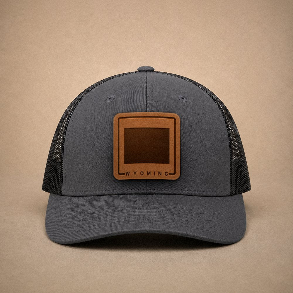 Charcoal Wyoming hats — Wyoming Outline Leather Patch Trucker Hat