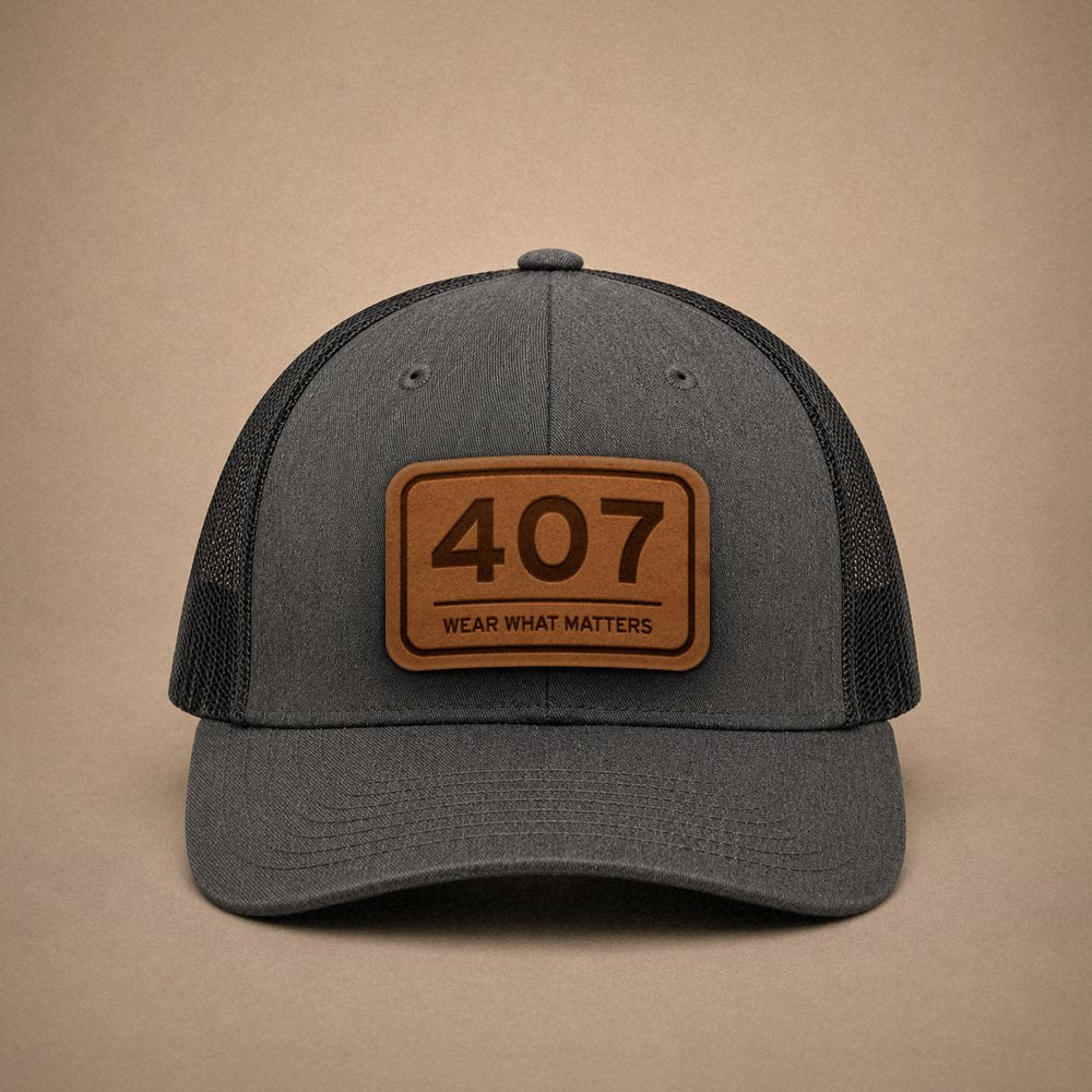 Dark Heather Grey Orlando hats — Orlando 407 Leather Patch Trucker Hat