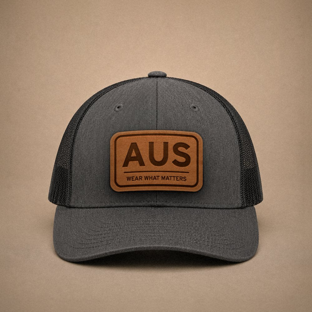 Dark Heather Grey Austin hats — Austin AUS Leather Patch Trucker Hat
