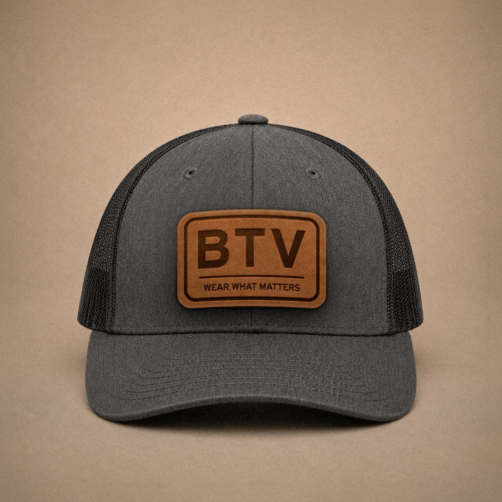 Dark Heather Grey Burlington hats — Burlington BTV Leather Patch Trucker Hat