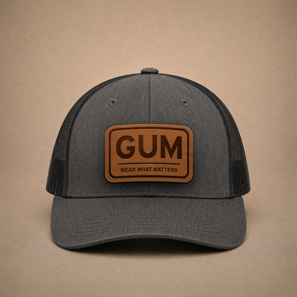 Dark Heather Grey Guam hats — Guam GUM Leather Patch Trucker Hat