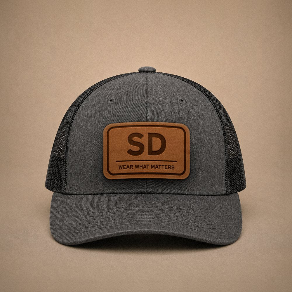 Dark Heather Grey South Dakota hats — South Dakota SD Leather Patch Trucker Hat
