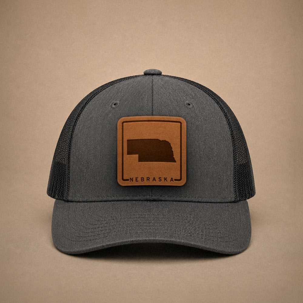 Dark Heather Grey Nebraska hats — Nebraska Outline Leather Patch Trucker Hat