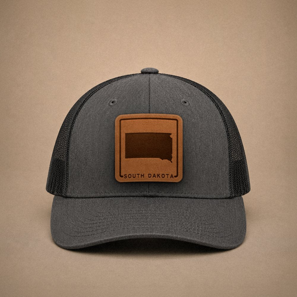 Dark Heather Grey South Dakota hats — South Dakota Outline Leather Patch Trucker Hat
