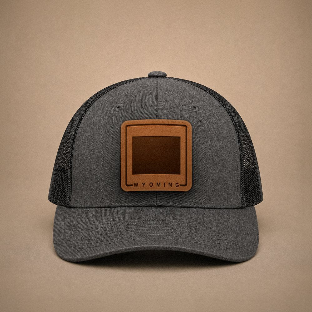 Dark Heather Grey Wyoming hats — Wyoming Outline Leather Patch Trucker Hat