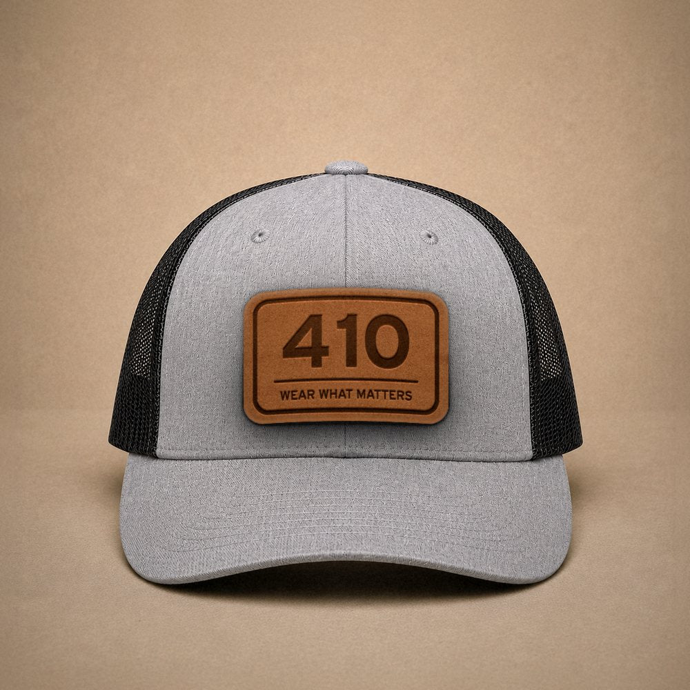 Heather Grey Baltimore hats — Baltimore 410 Leather Patch Trucker Hat