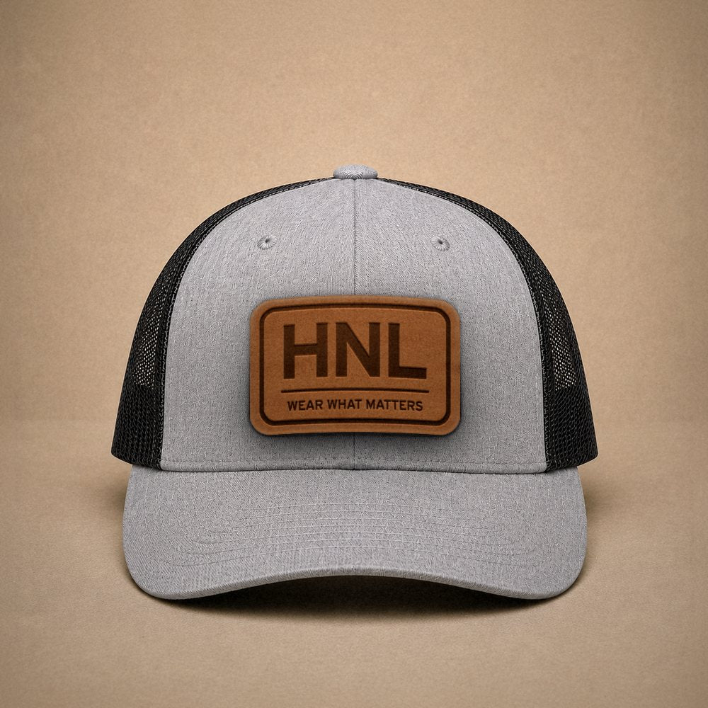 Heather Grey Honolulu hats — Honolulu HNL Leather Patch Trucker Hat