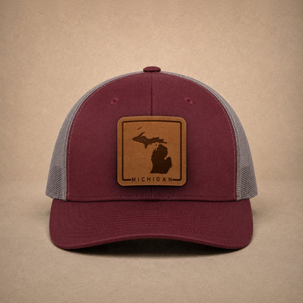 Maroon Michigan hats — Michigan Outline Leather Patch Trucker Hat