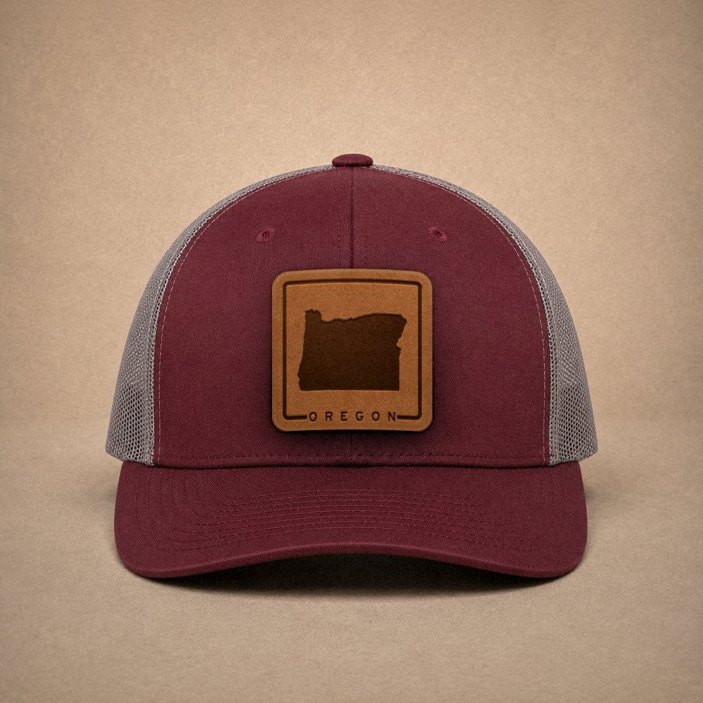 Maroon Oregon hats — Oregon Outline Leather Patch Trucker Hat
