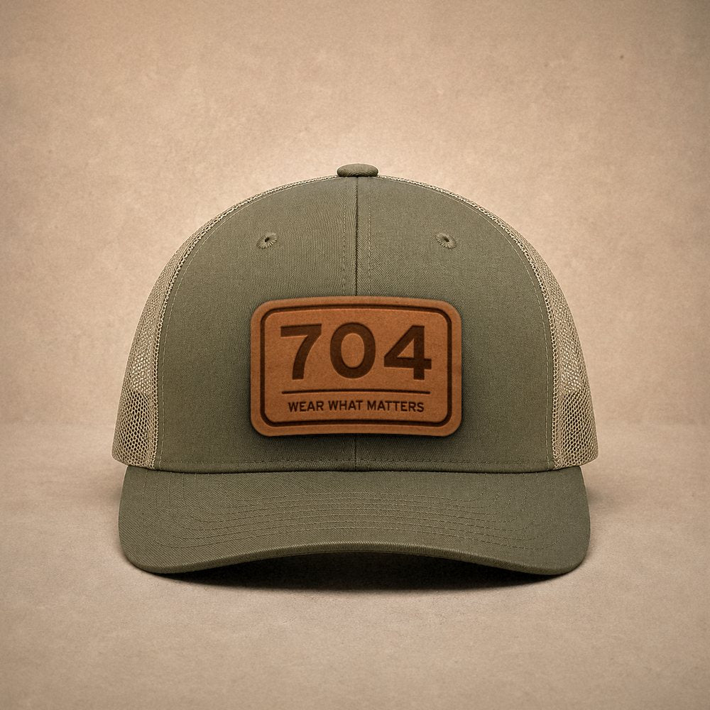 Moss Charlotte hats — Charlotte 704 Leather Patch Trucker Hat