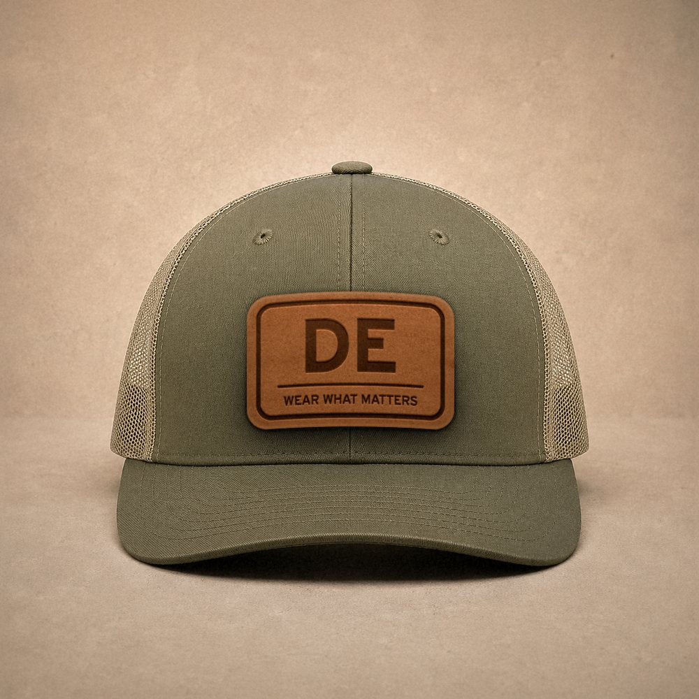 Moss Delaware hats — Delaware DE Leather Patch Trucker Hat