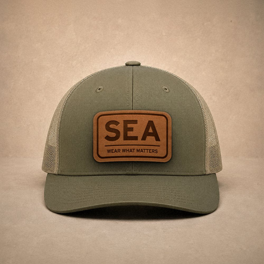 Moss Seattle hats — Seattle SEA Leather Patch Trucker Hat