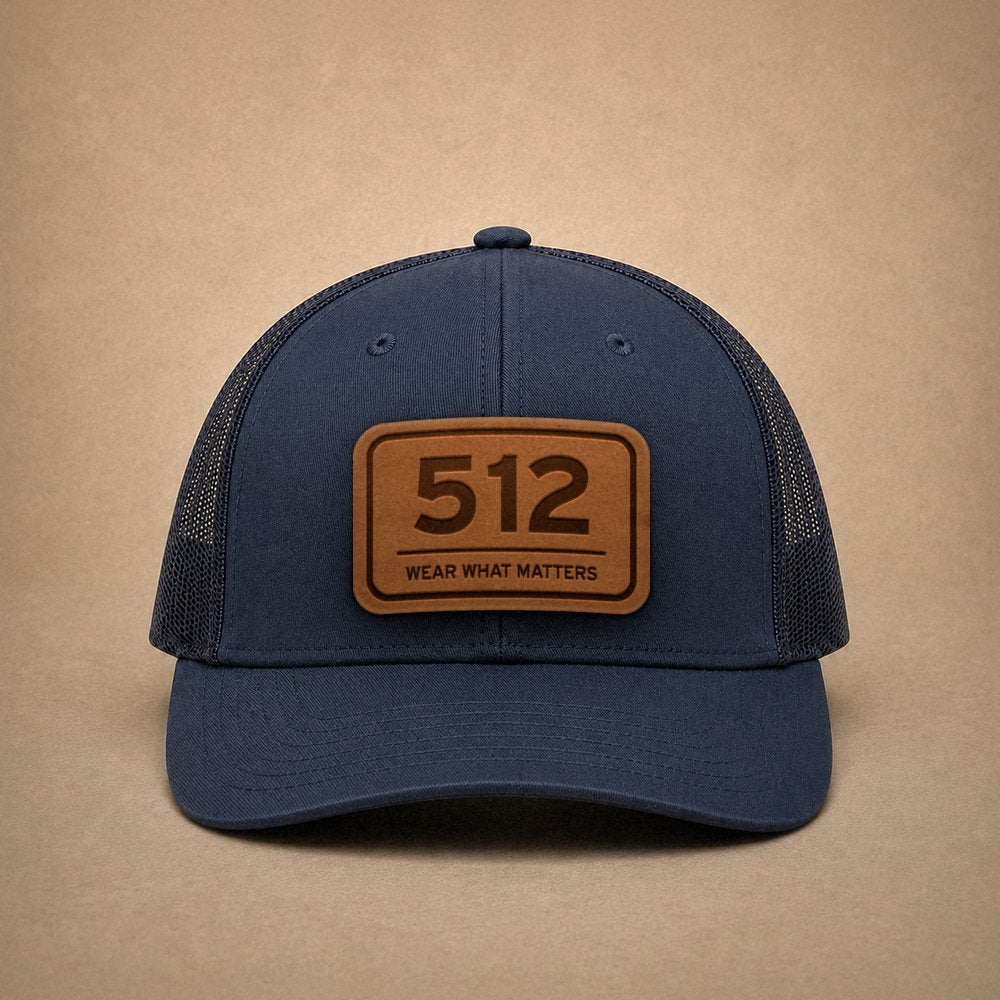 Navy Austin hats — Austin 512 Leather Patch Trucker Hat