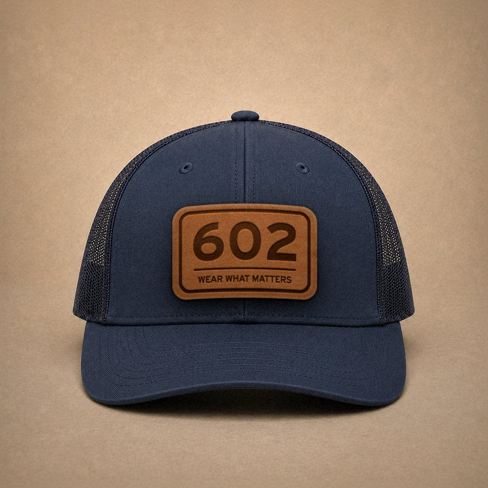Navy Phoenix hats — Phoenix 602 Leather Patch Trucker Hat