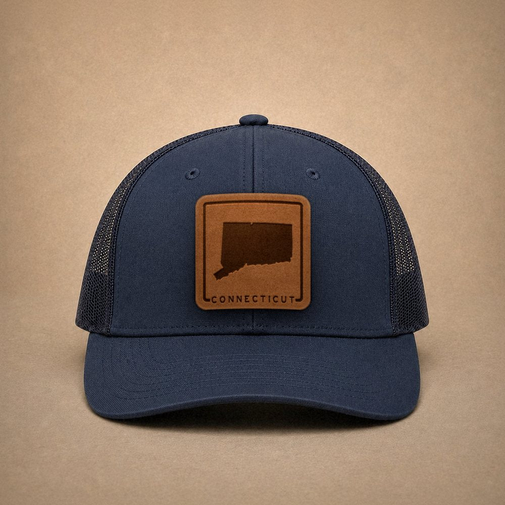 Navy Connecticut hats — Connecticut Outline Leather Patch Trucker Hat