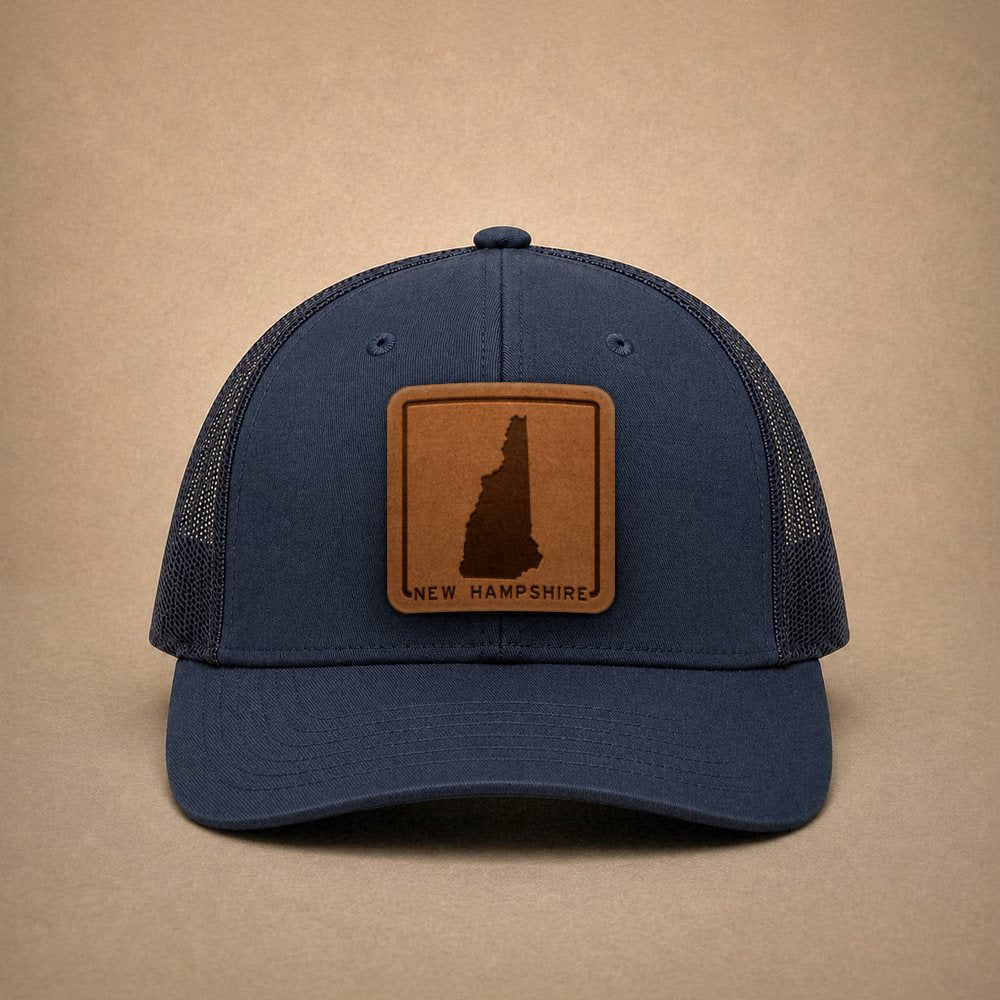 Navy New Hampshire hats — New Hampshire Outline Leather Patch Trucker Hat