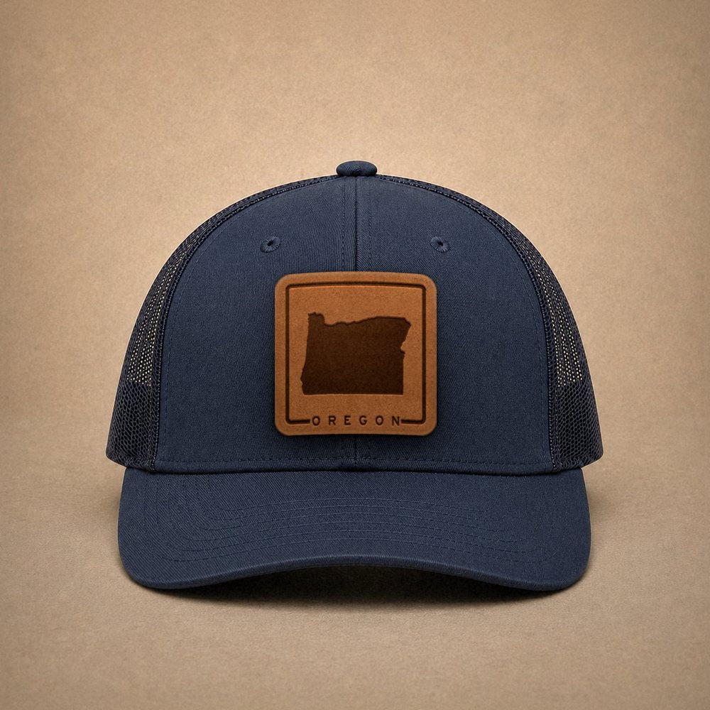 Navy Oregon hats — Oregon Outline Leather Patch Trucker Hat