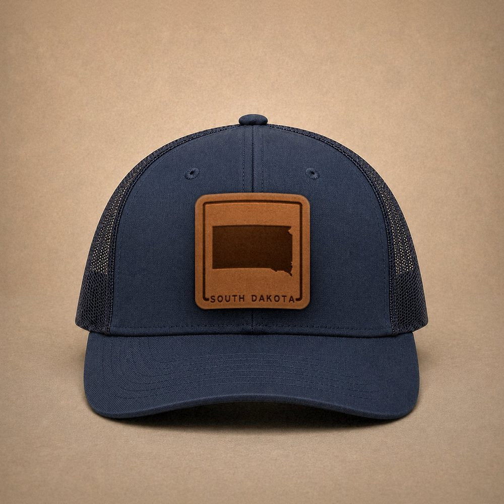 Navy South Dakota hats — South Dakota Outline Leather Patch Trucker Hat