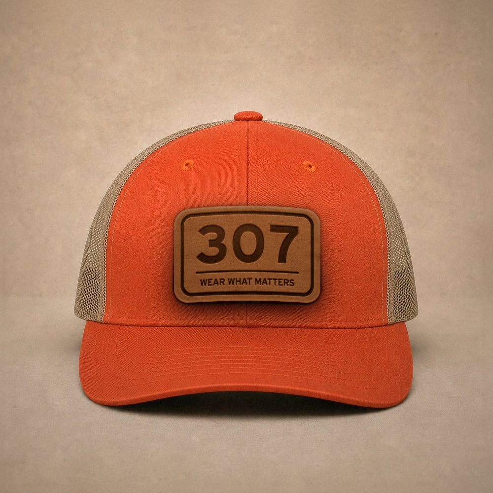 Orange Wyoming hats — Wyoming 307 Leather Patch Trucker Hat