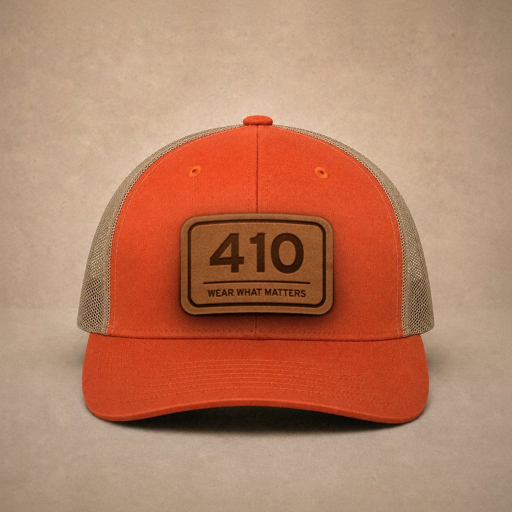 Orange Baltimore hats — Baltimore 410 Leather Patch Trucker Hat