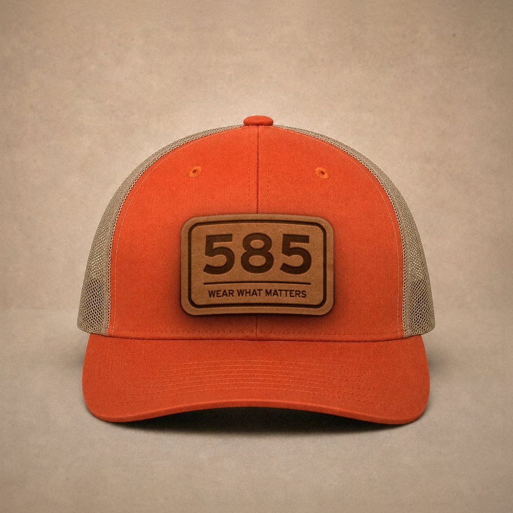 Orange Rochester hats — Rochester 585 Leather Patch Trucker Hat