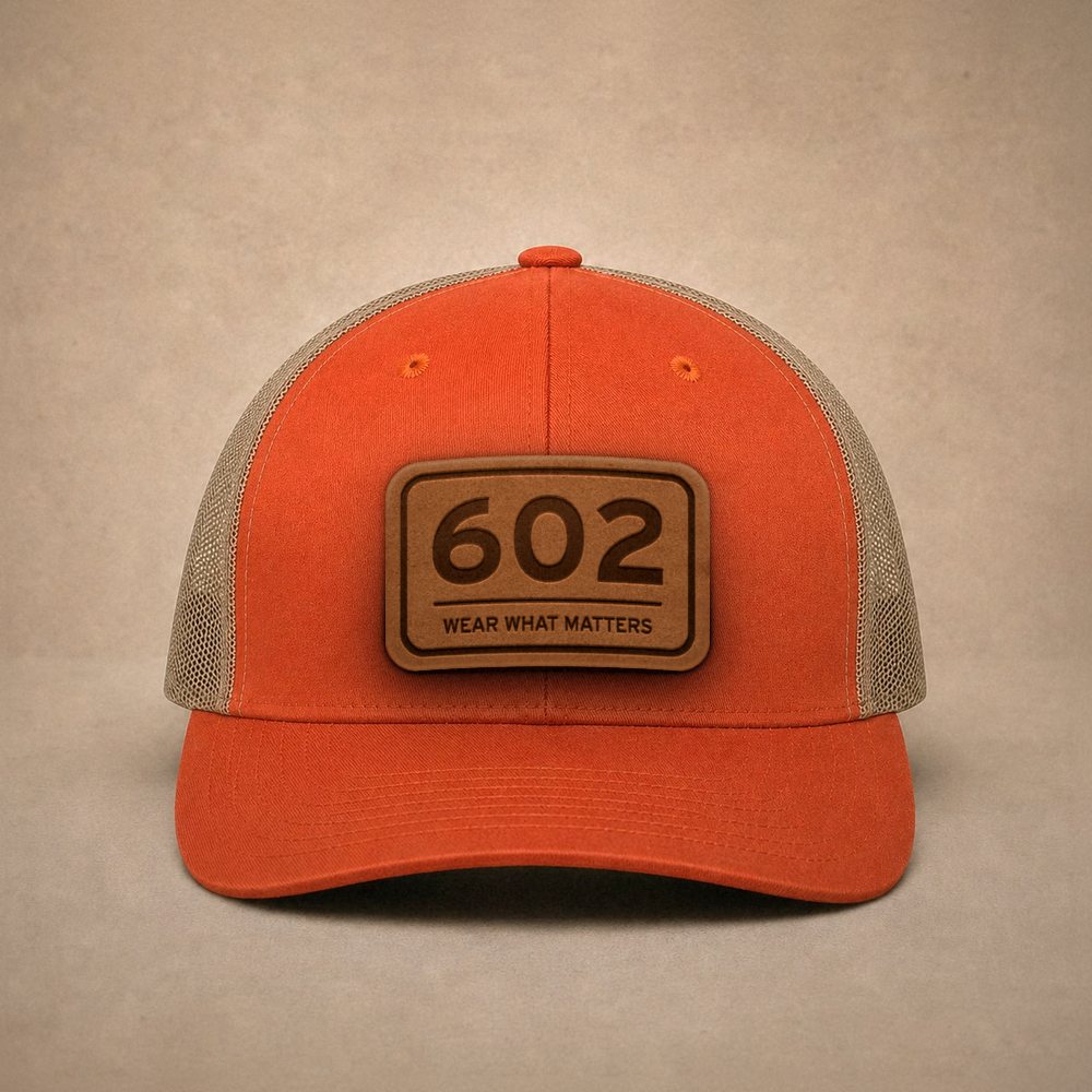 Orange Phoenix hats — Phoenix 602 Leather Patch Trucker Hat
