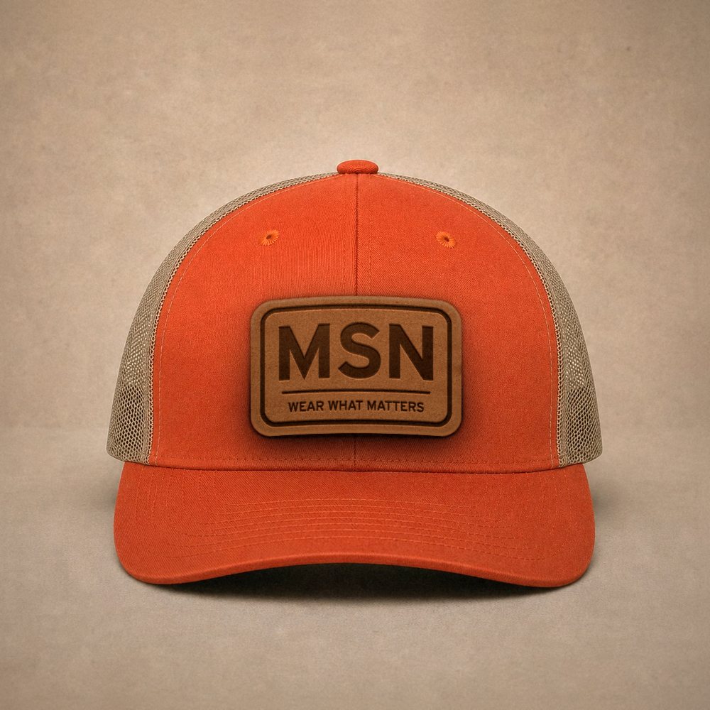 Orange Madison hats — Madison MSN Leather Patch Trucker Hat