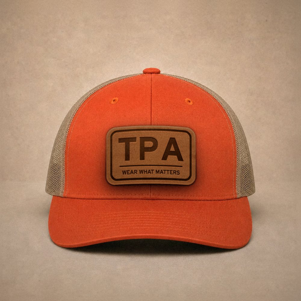 Orange Tampa hats — Tampa TPA Leather Patch Trucker Hat