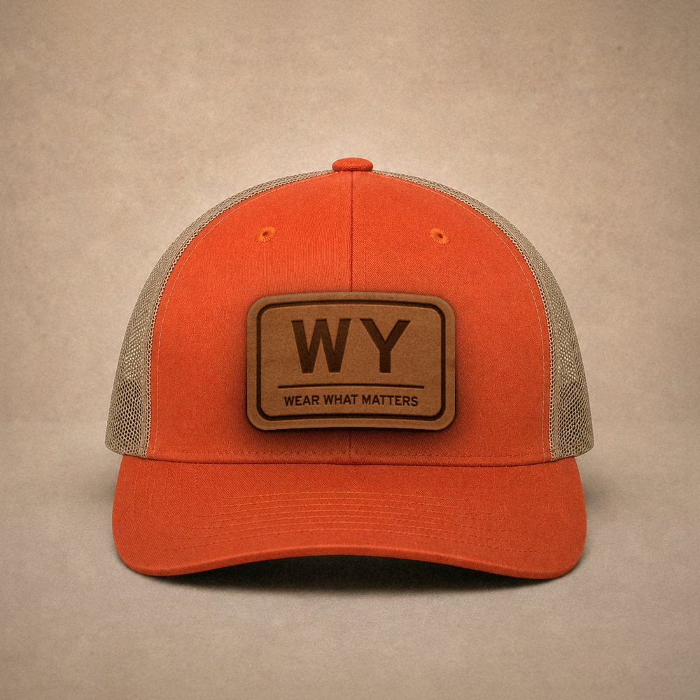 Orange Wyoming hats — Wyoming WY Leather Patch Trucker Hat