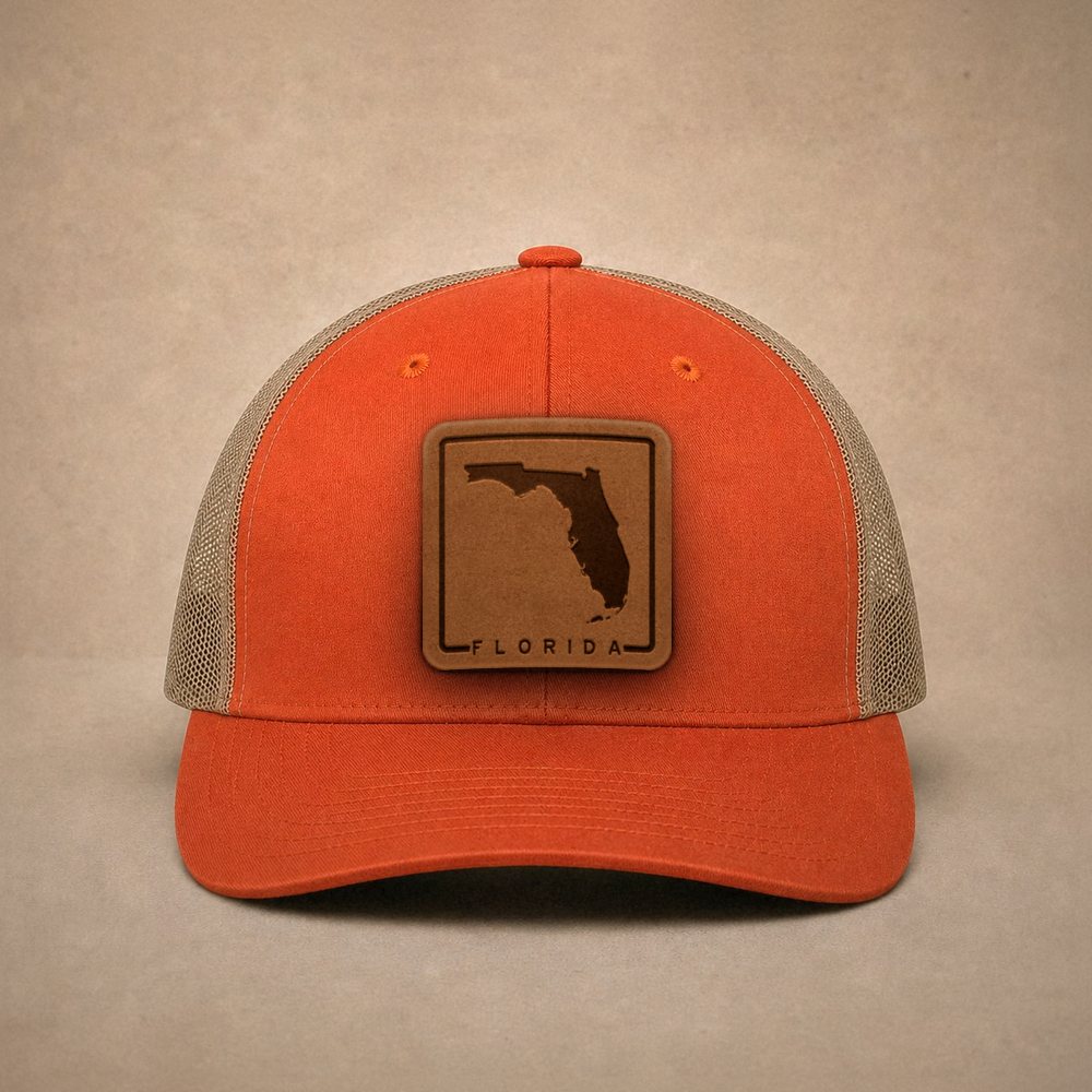 Orange Florida hats — Florida Outline Leather Patch Trucker Hat