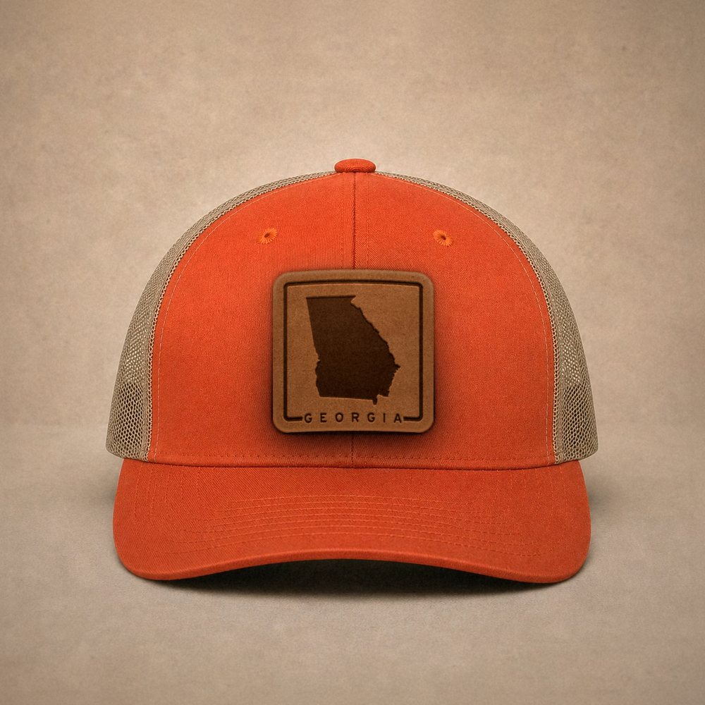 Orange Georgia hats — Georgia Outline Leather Patch Trucker Hat