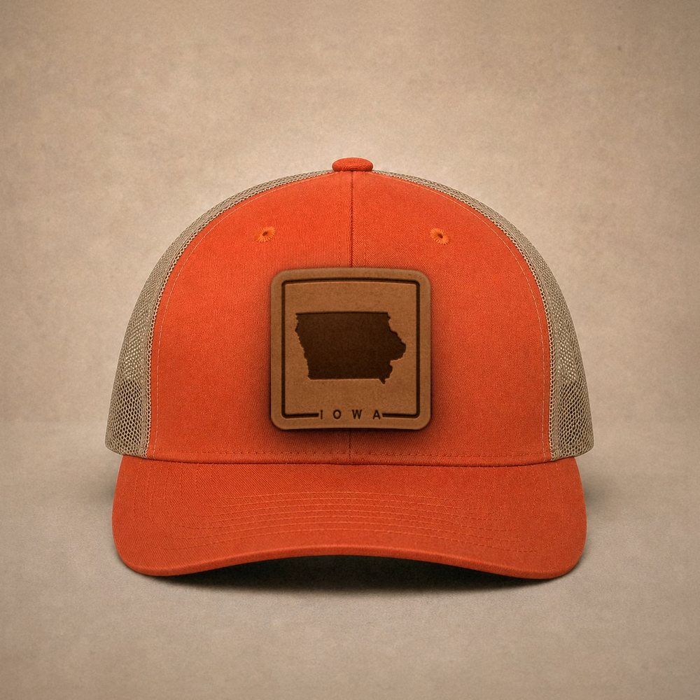 Orange Iowa hats — Iowa Outline Leather Patch Trucker Hat