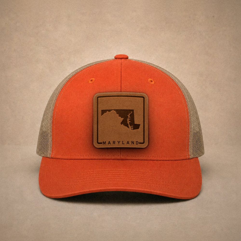 Orange Maryland hats — Maryland Outline Leather Patch Trucker Hat