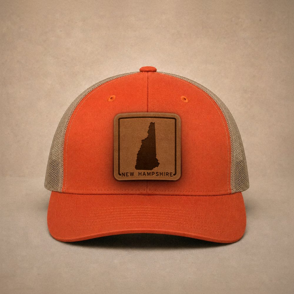 Orange New Hampshire hats — New Hampshire Outline Leather Patch Trucker Hat